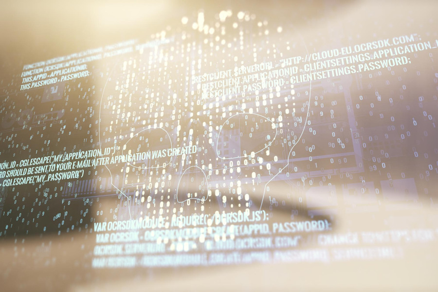 double-exposure-abstract-virtual-creative-code-skull-hologram-empty-modern-office-background-malware-cyber-crime-concept (1)